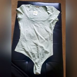 Short sleeved Free People Cloudy Sage color bodysuit (NWT) - medium